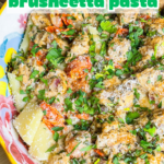 If you're looking for a dinner that feels a little fancy but is secretly easy and totally family-friendly, this Creamy Bruschetta Chicken Pasta is it. Juicy, seasoned chicken is tossed with tender pasta in a rich, parmesan cream sauce a with a fresh marinated tomatoes that add just the right pop of brightness.