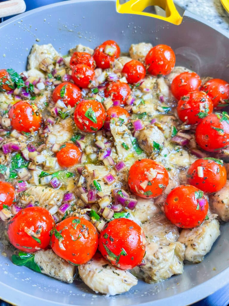 If you're looking for a dinner that feels a little fancy but is secretly easy and totally family-friendly, this Creamy Bruschetta Chicken Pasta is it. Juicy, seasoned chicken is tossed with tender pasta in a rich, parmesan cream sauce a with a fresh marinated tomatoes that add just the right pop of brightness.