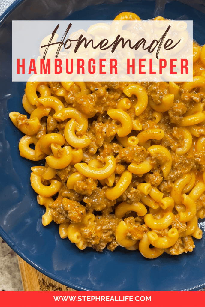 A blue plate filled with macaroni pasta and ground beef in a creamy, orange sauce. The text reads Homemade Hamburger Helper, highlighting this classic comfort food, and the website www.stephreallife.com is visible at the bottom.