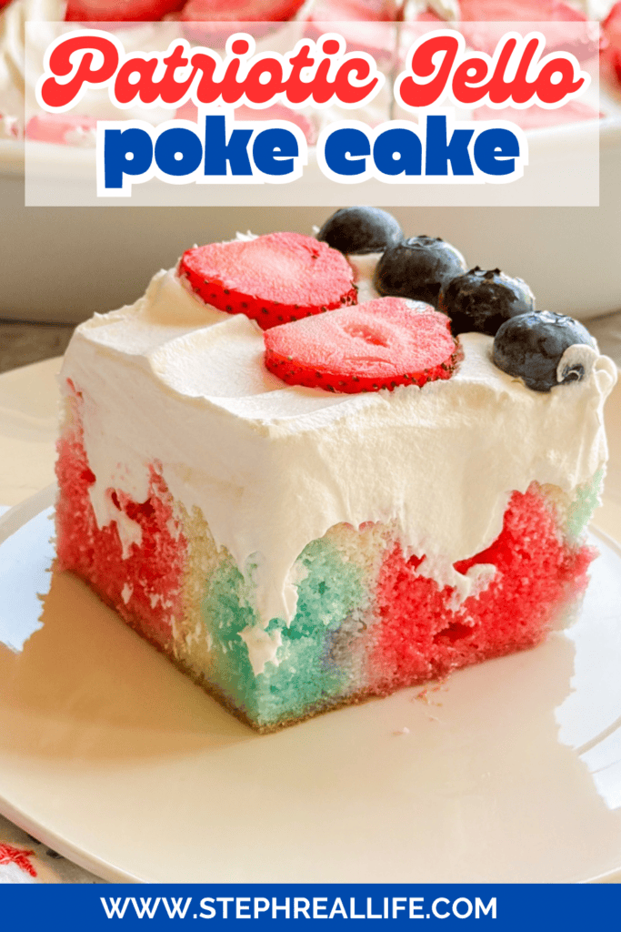 A slice of Patriotic Jell-O Poke Cake topped with whipped cream, sliced strawberries, and blueberries sits on a white plate. The text reads Patriotic Jello poke cake and www.stephreallife.com.