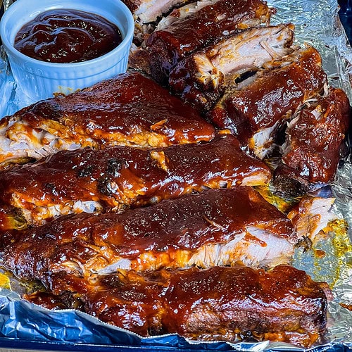 Once you make ribs in the crock pot, you won't want to cook them any other way! Crock Pot Ribs cook low and slow all day for fall off the bone tender, juicy ribs and they couldn't be easier.