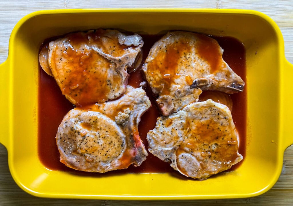 These Pittsburgh Pork Chops are a classic—juicy, oven-baked pork chops smothered in sweet and tangy chili sauce, soft caramelized onions, and a savory pan gravy that’s begging to be poured over mashed potatoes.
