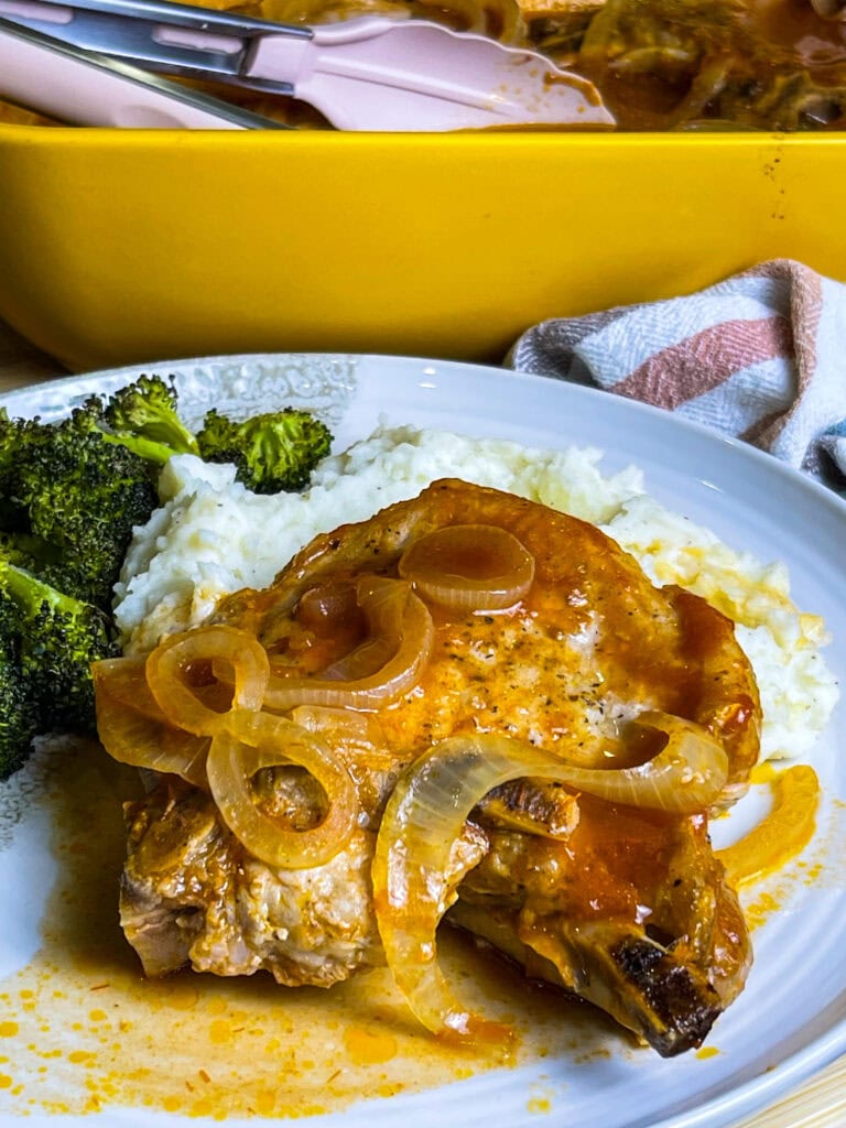 These Pittsburgh Pork Chops are a classic—juicy, oven-baked pork chops smothered in sweet and tangy chili sauce, soft caramelized onions, and a savory pan gravy that’s begging to be poured over mashed potatoes.