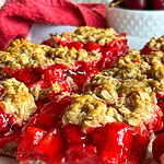Cherry Apple Oat Bars have a chewy oat crust, sweet-tart cherry apple fruit filling, and a crumbly crunchy oat topping.