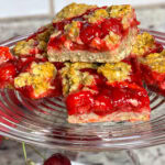 Cherry Apple Oat Bars have a chewy oat crust, sweet-tart cherry apple fruit filling, and a crumbly crunchy oat topping.