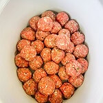 ground meat stuffed with rice slow cooked in a tomato based sauce