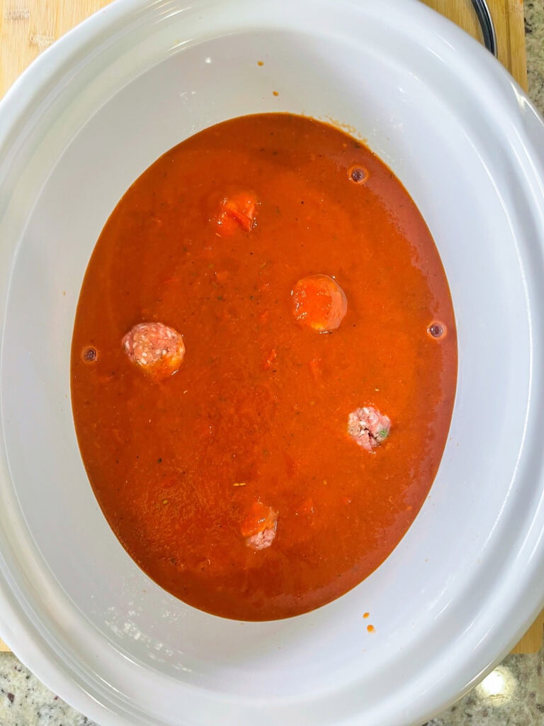 ground meat stuffed with rice slow cooked in a tomato based sauce