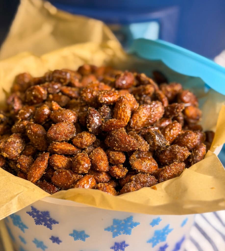 almonds coated in cinnamon and sugar in a crock pot