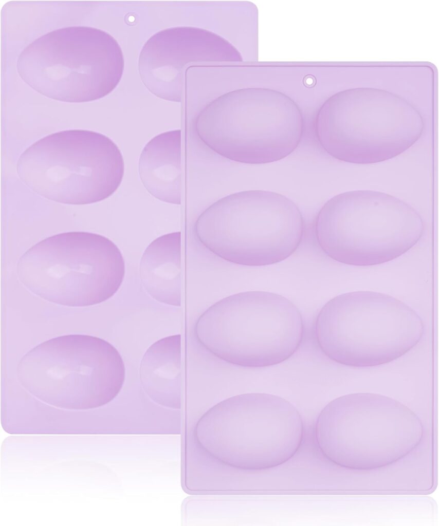 Two purple silicone molds with six oval-shaped cavities each, arranged side by sideโperfect for Easy Easter Treat Ideas or crafting unique egg-shaped goodies.