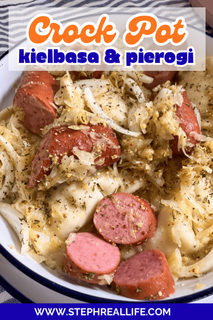 A bowl of crock pot kielbasa and pierogi, topped with cooked onions and herbs. Slices of sausage and pierogi are mixed together in a creamy sauce. Text reads Crock Pot kielbasa & pierogi and www.stephreallife.com.