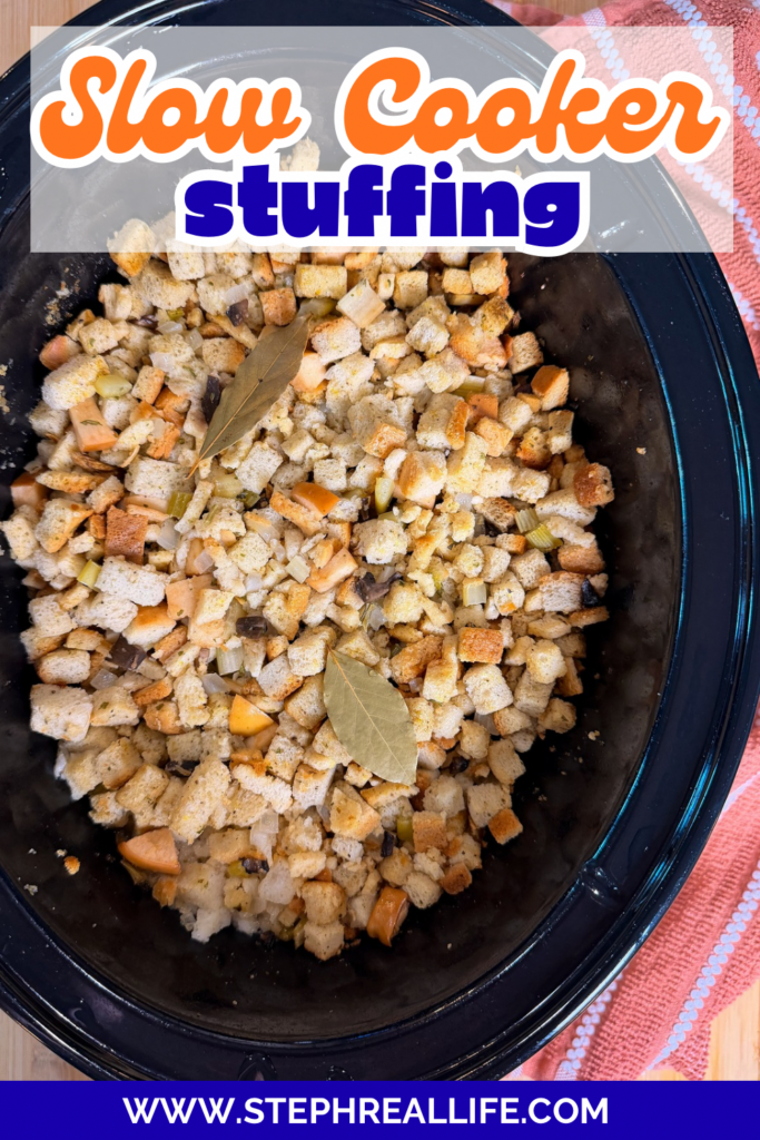 A slow cooker filled with golden-brown stuffing cubes and bay leaves, sitting on a striped red towel. Text on the image reads Slow Cooker stuffing and www.stephreallife.com.